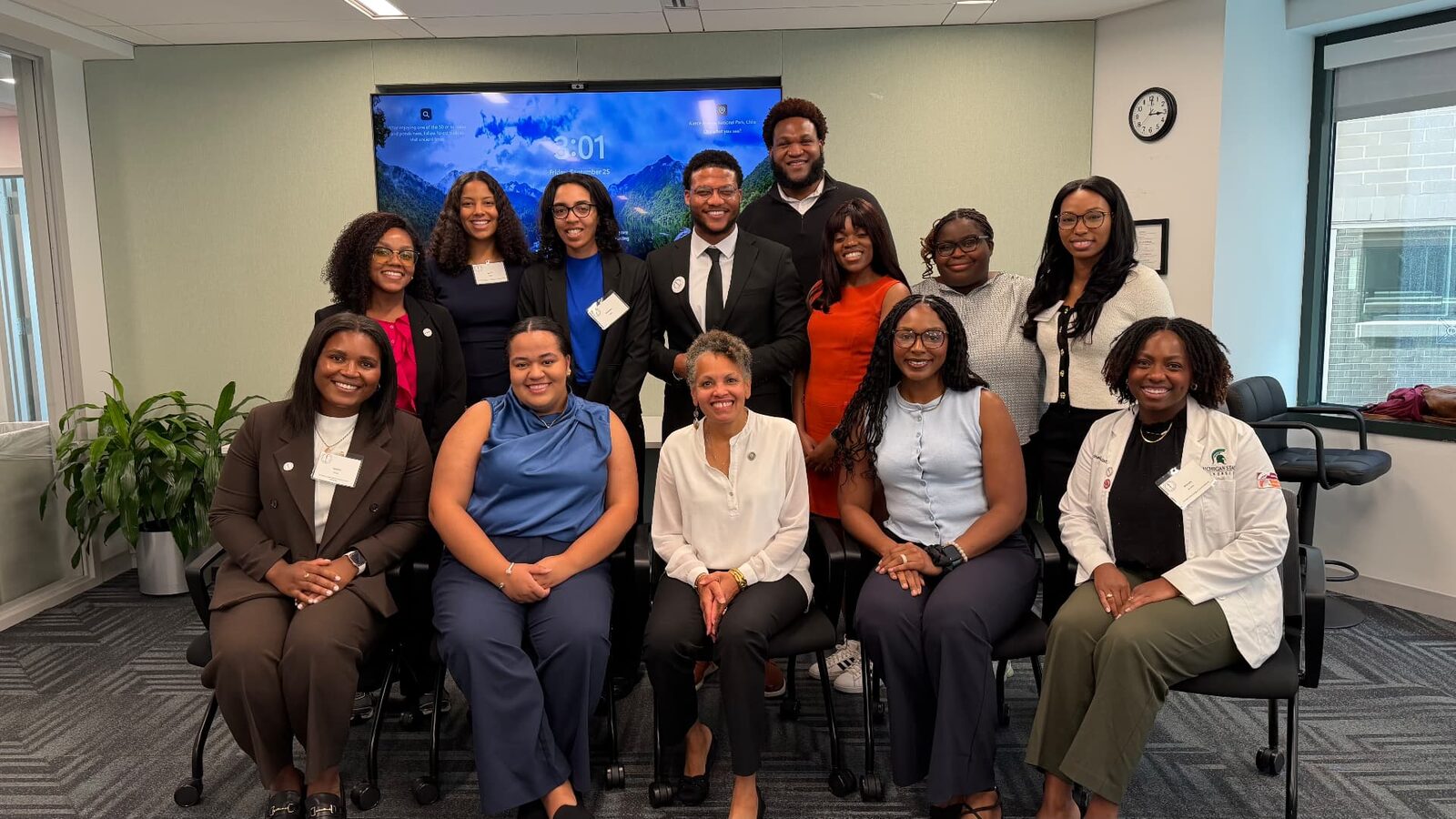 Tyren Brown with a group of healthcare professionals at an event