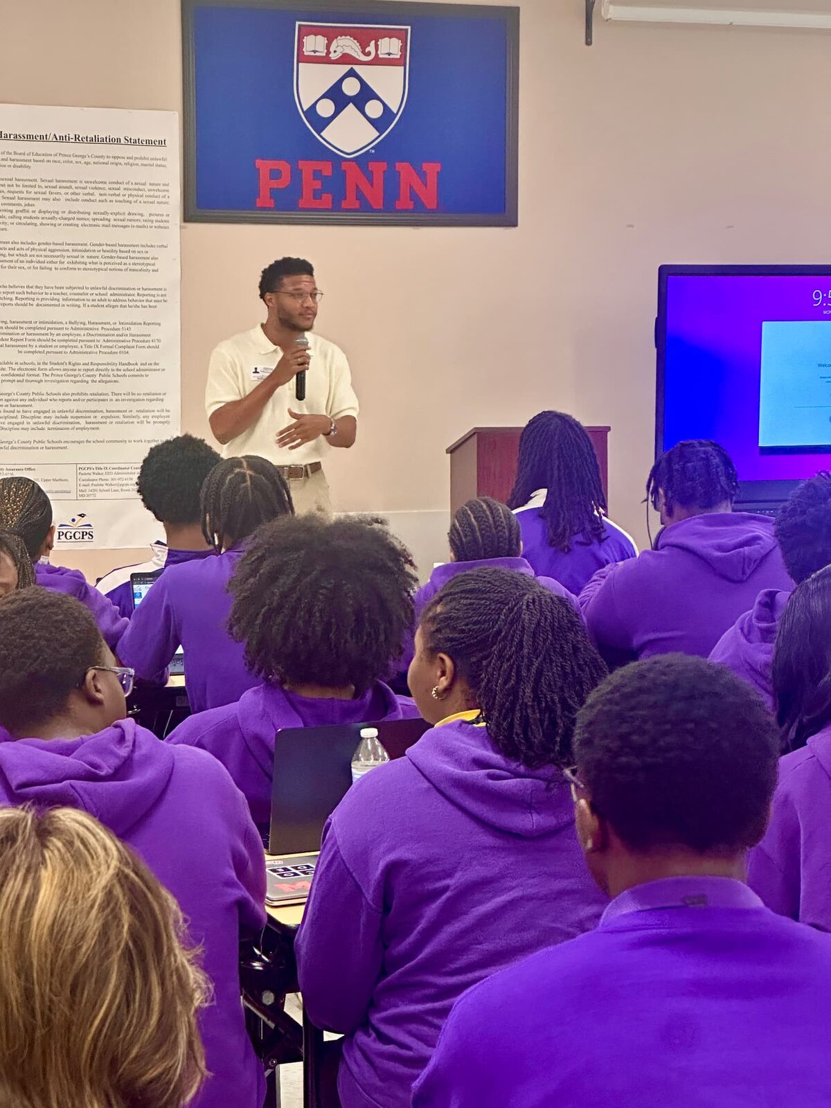 Tyren Brown speaking to a seated student audience