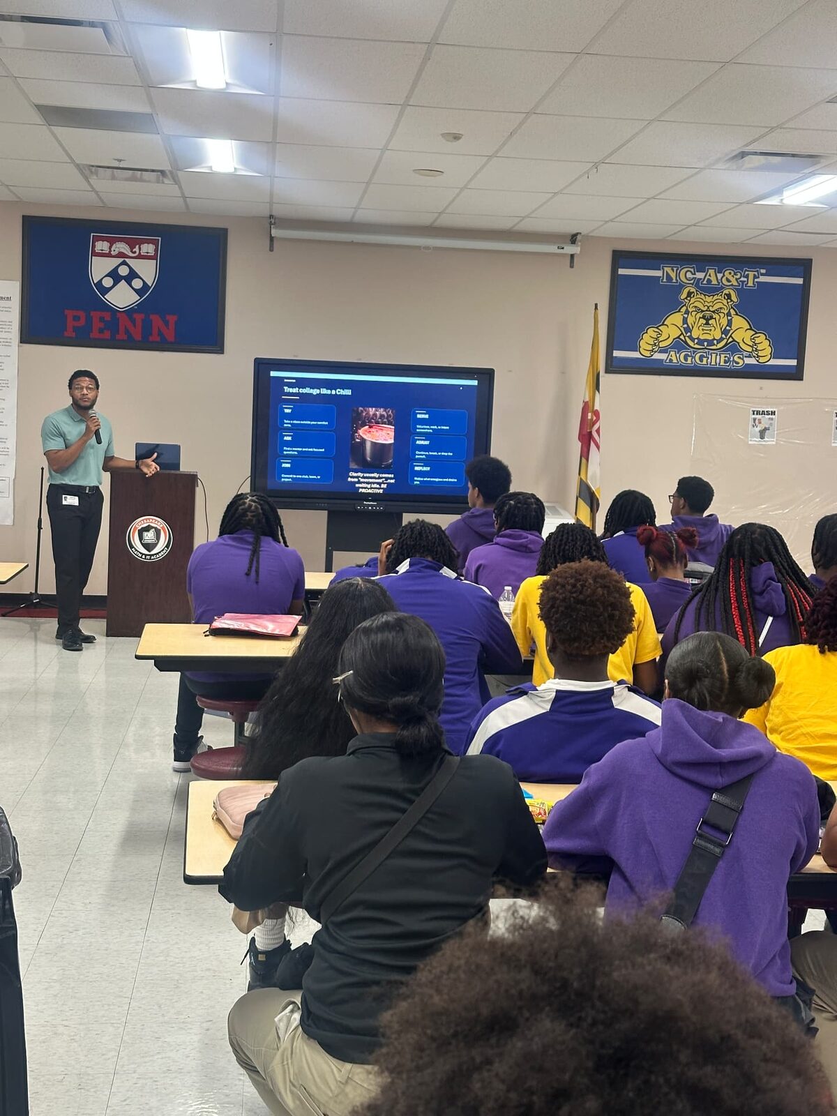 Tyren Brown leading a conversation in a classroom